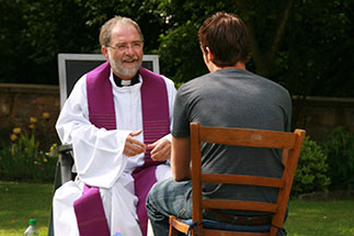 Priesthood Priest talking with man
